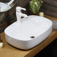 800-320327 Фигурный умывальник накладной MELANA 600х405х150