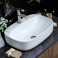 800-320326 Фигурный умывальник накладной закругленные края 585х420х150 MELANA