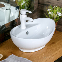 800-7167 (3073) Фигурный умывальник лодочка 600х390х210 MELANA